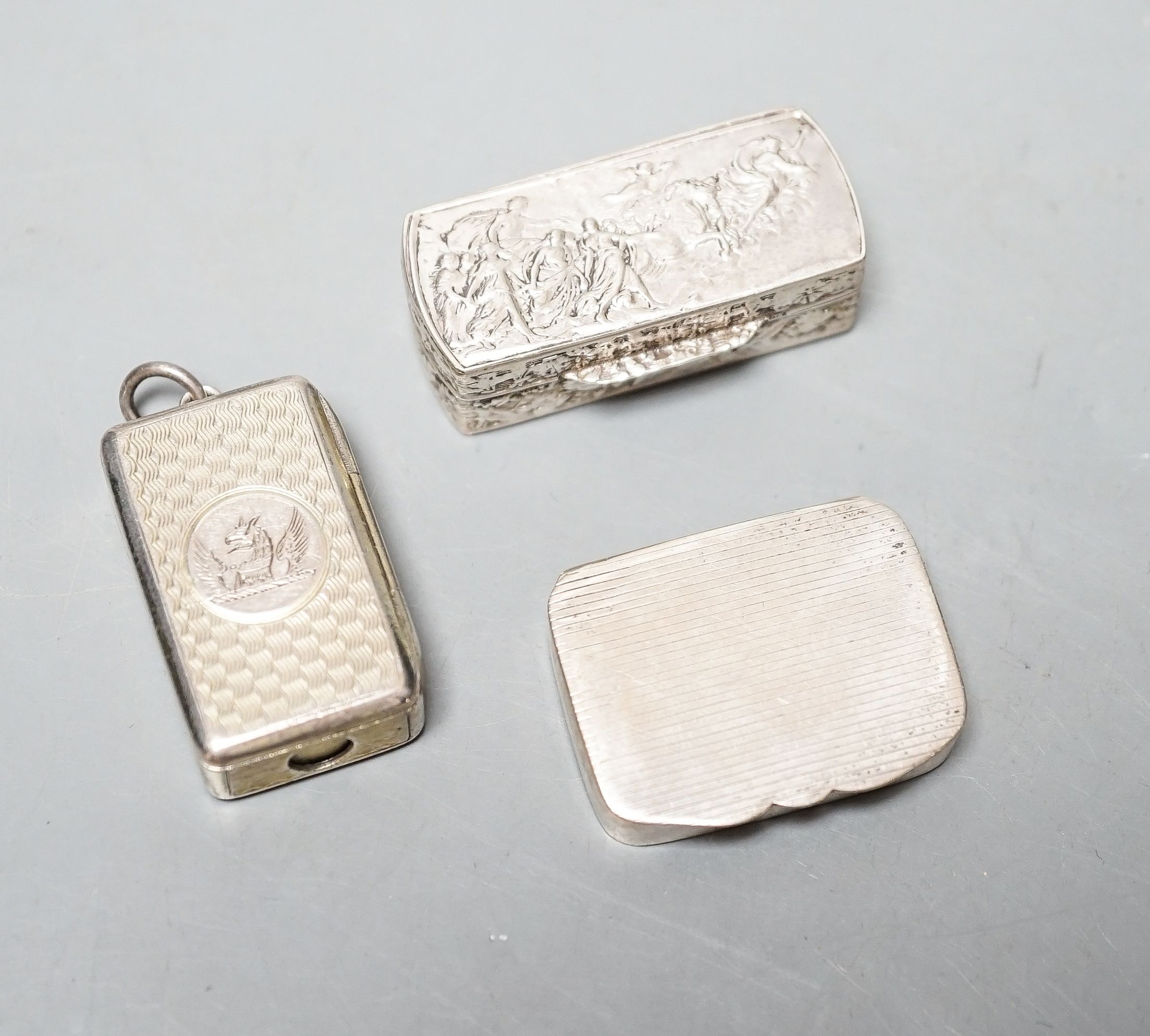 A Victorian silver gilt combination snuff box/ cigar cutter? London, 1855, 32mm and two later boxes.